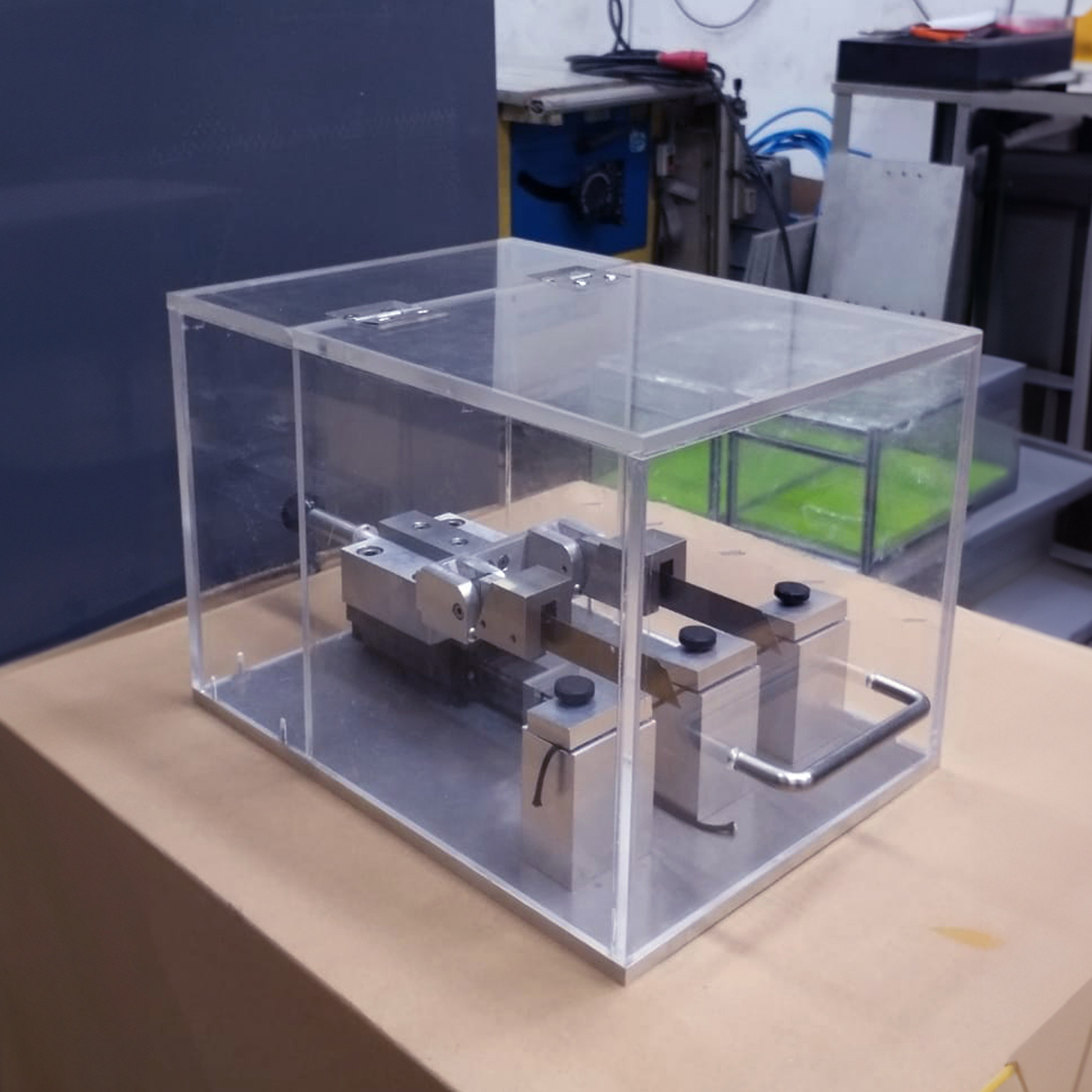 Clear acrylic box with an opened lid