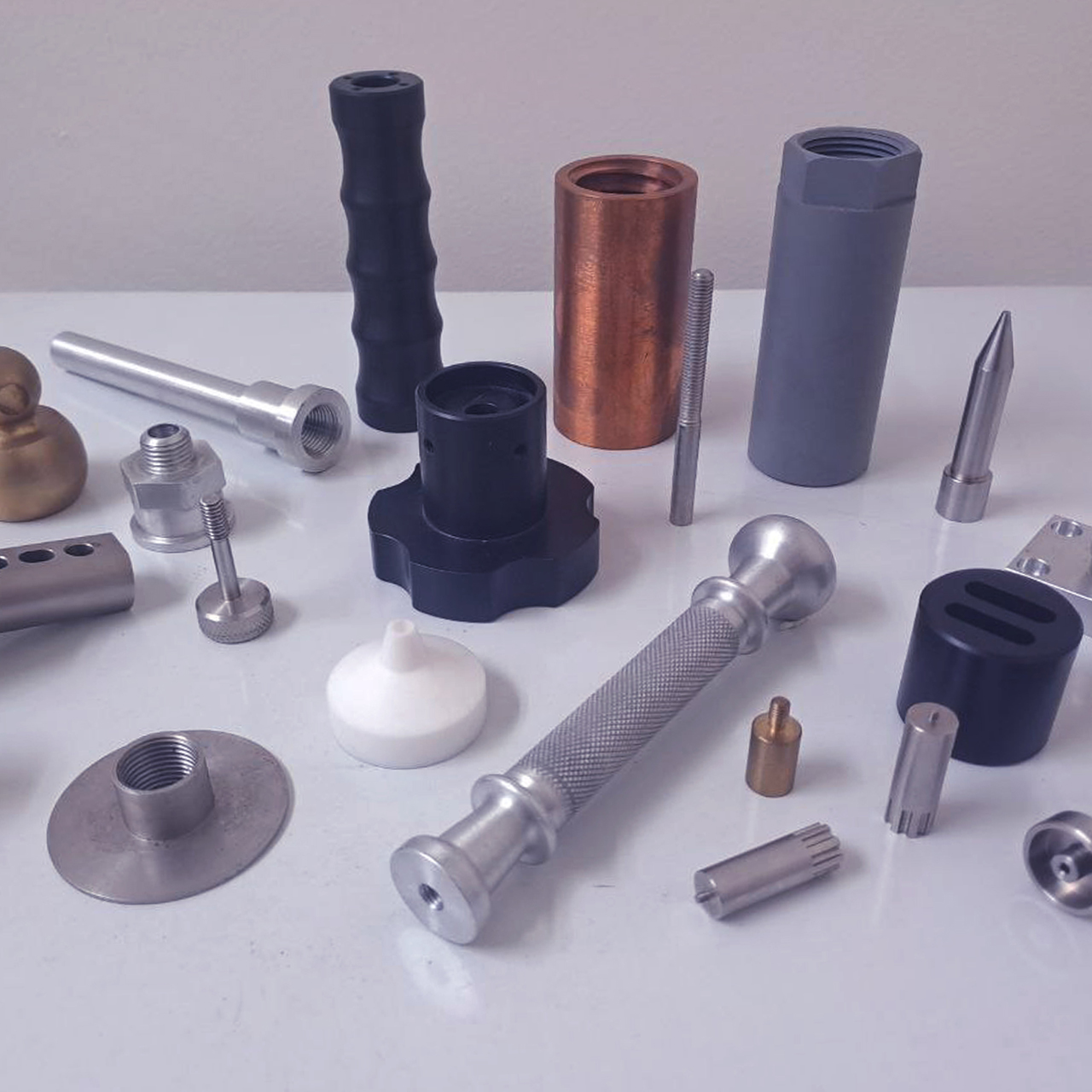 An assortment of CNC turned products