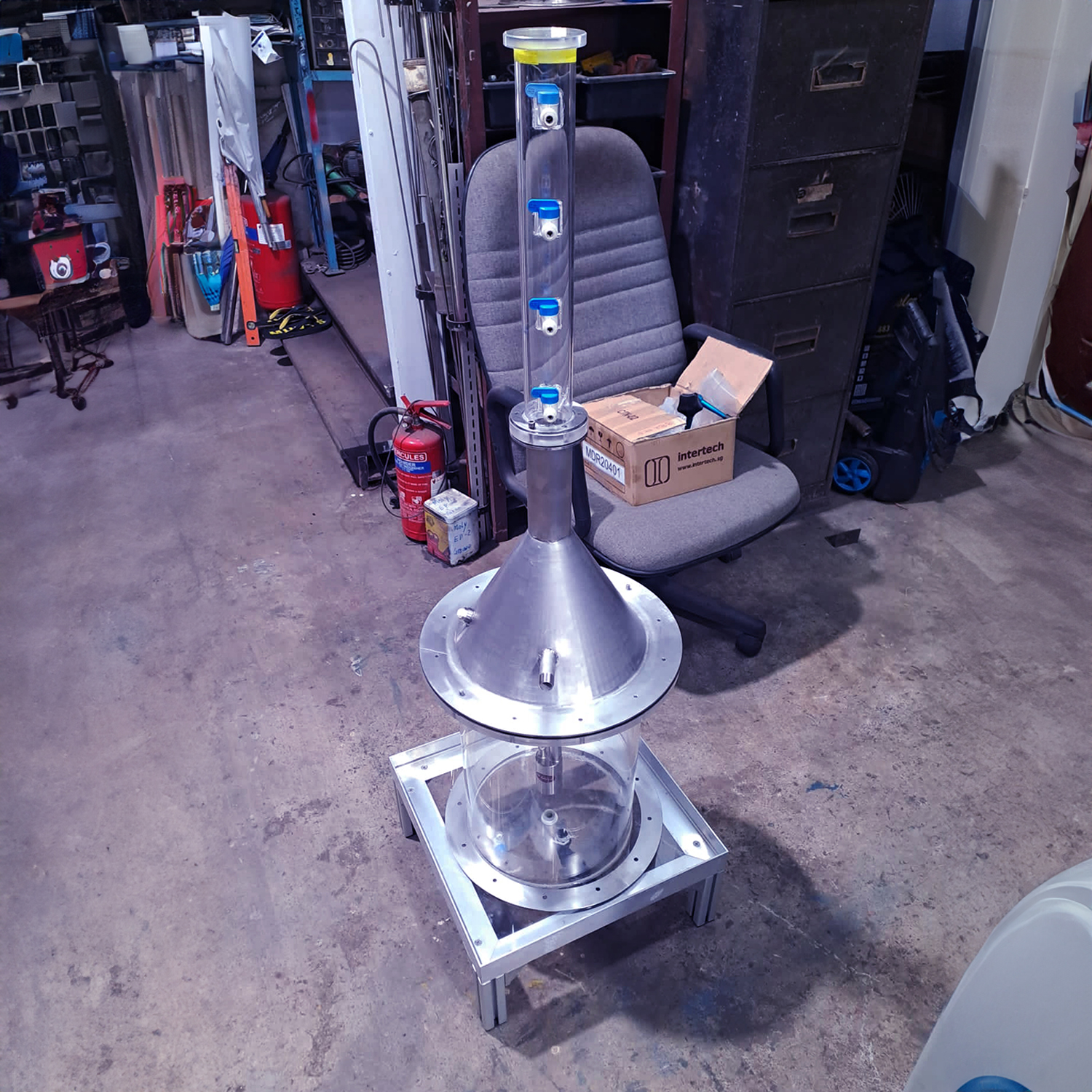Conical stainless steel tank with acrylic tube